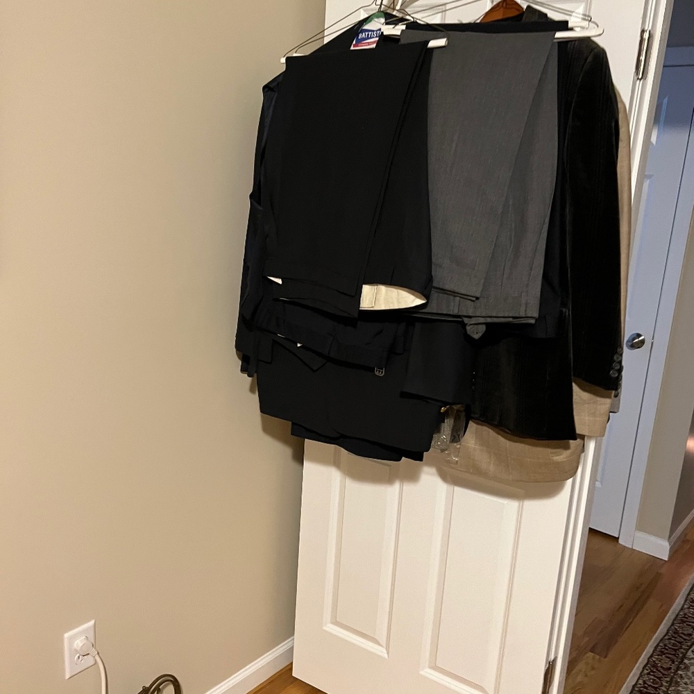 Several custom suits in perfect condition